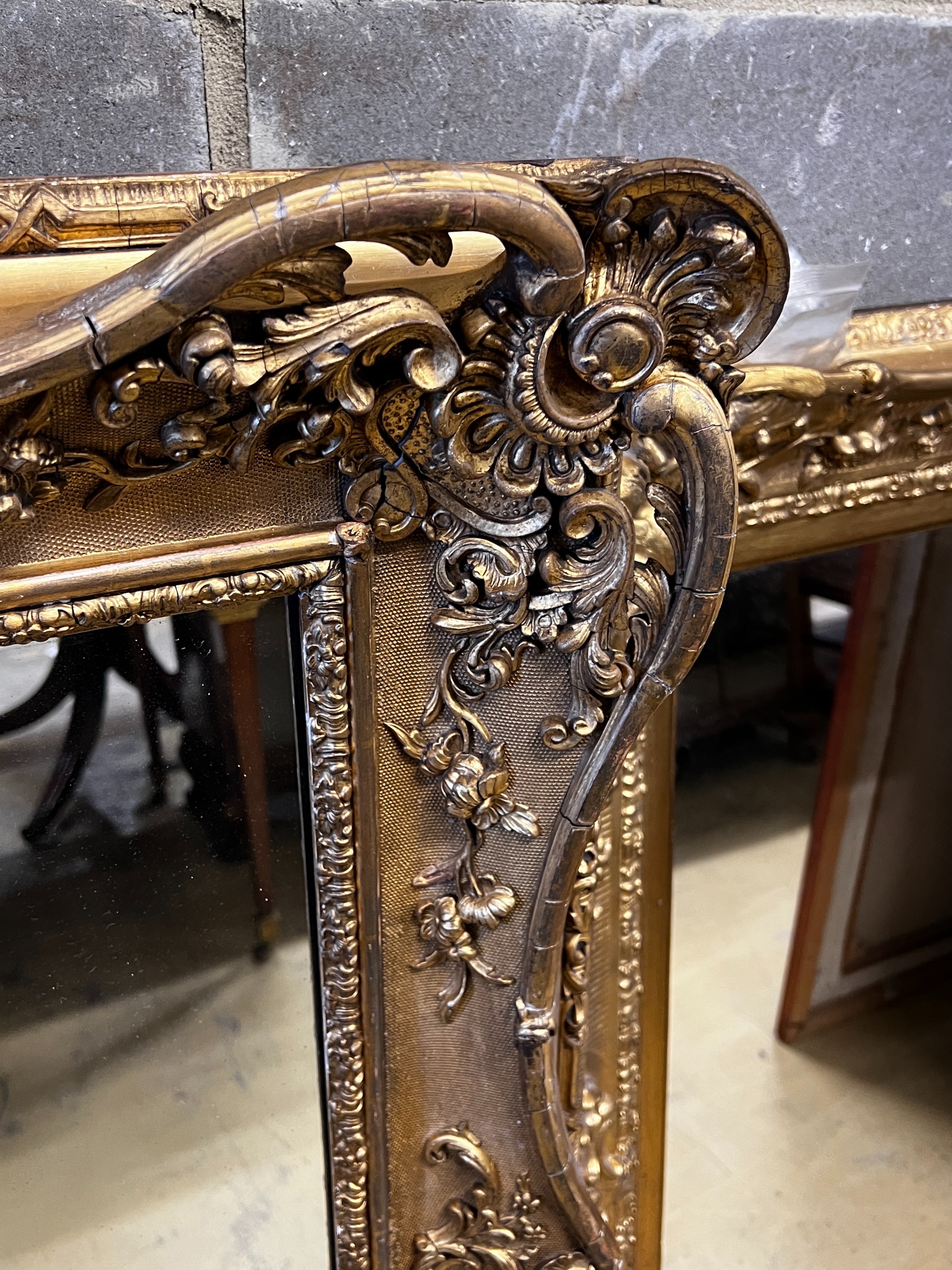 A Victorian giltwood and composition rectangular wall mirror converted from a picture frame, width 94cm, height 112cm